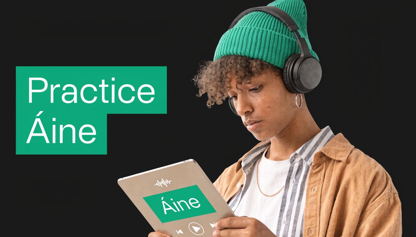 A person wearing a green beanie and headphones holding a tablet while learning to pronounce Áine.