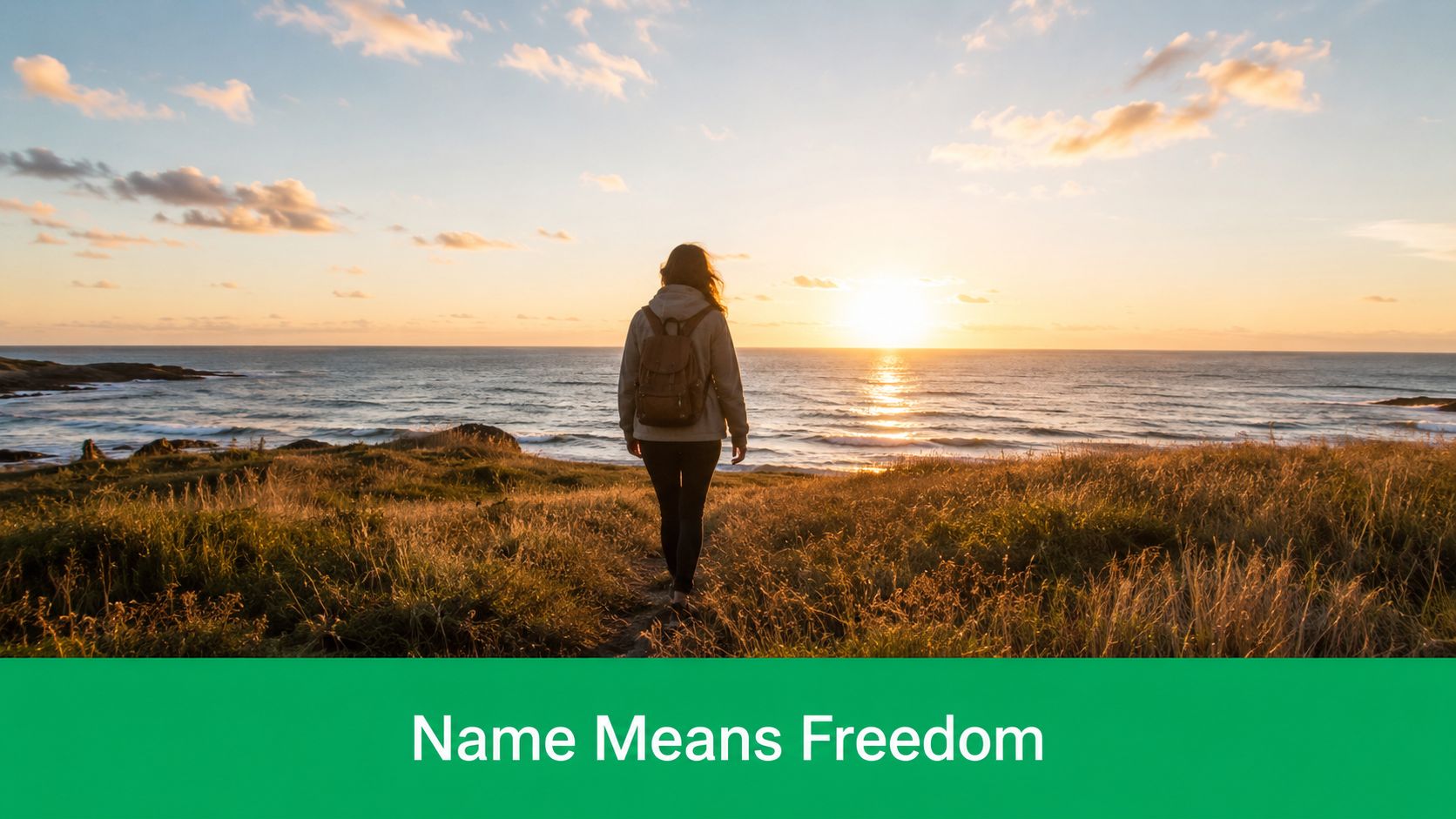 A traveler with a backpack walking through a grassy field towards the ocean at sunrise.